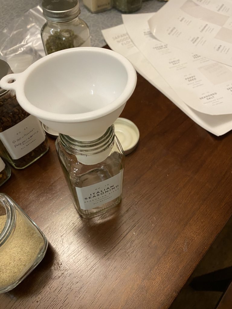 Funnel for transferring spices into their new jars.