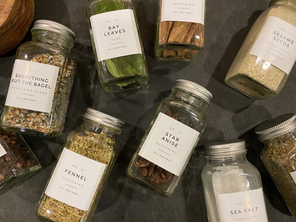 Photo of spices and modern labels.